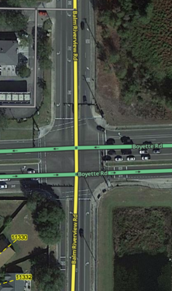 Median Segment with roads on each side of the divided roadway where the road name does NOT change at the intersection